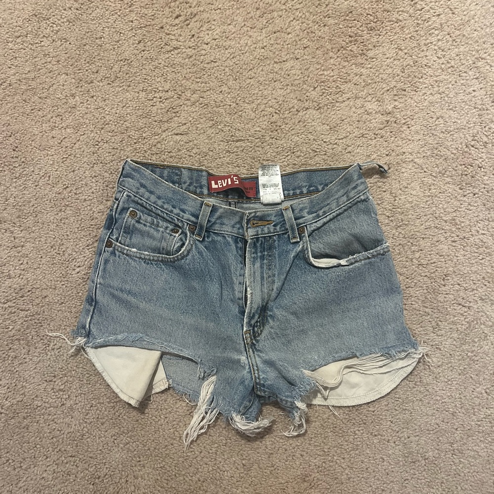Vintage Levi’s shorts would fit size 26